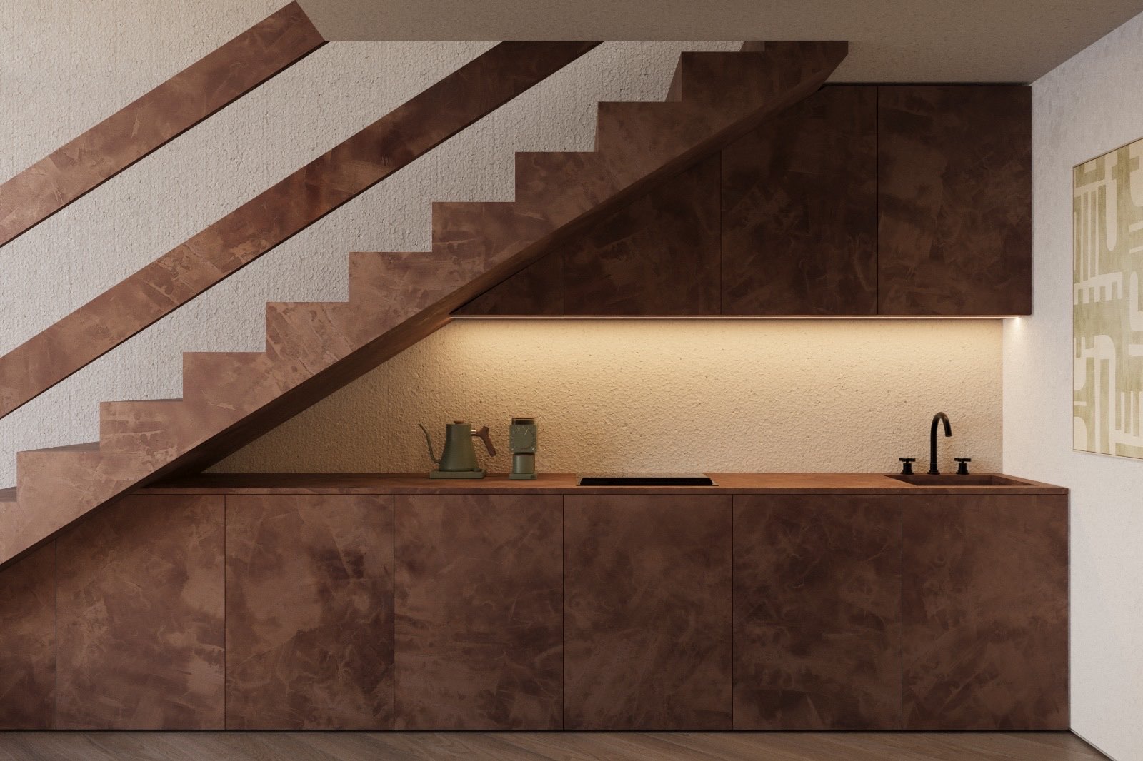 Kitchen tucked under the staircase with copper cabinet fronts
